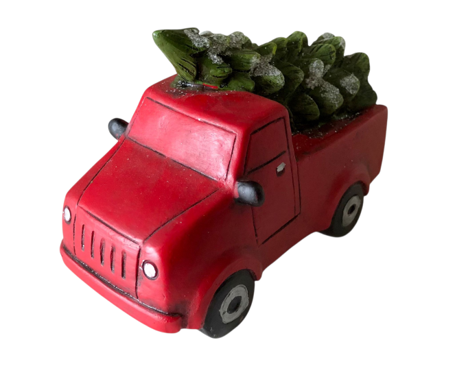 Rode auto met kerstboom