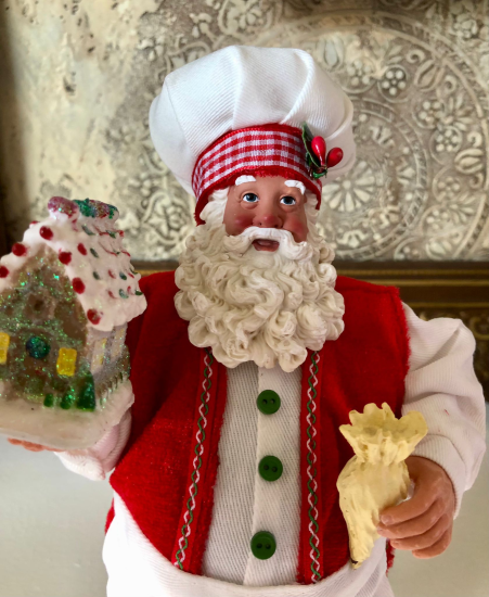 Kerstman met peperkoekhuisje