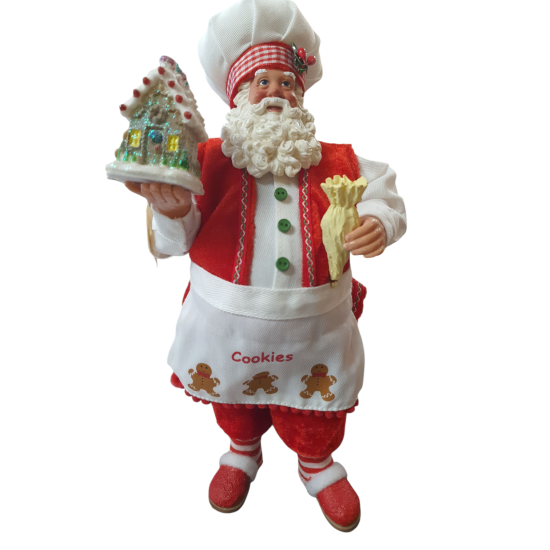 Kerstman met peperkoekhuisje