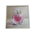 Wanddecoratie roze parfumfles