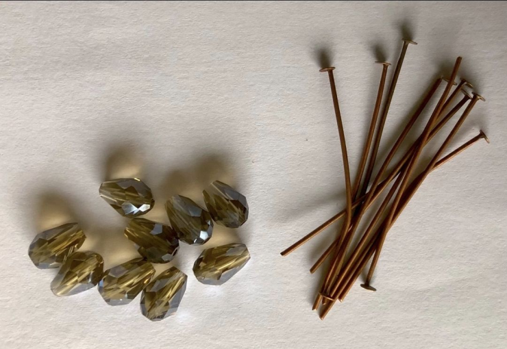 Bruine Kralen en metalen onderdelen