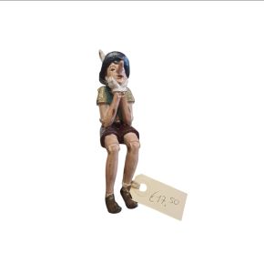 Pinokio Zittend Groot